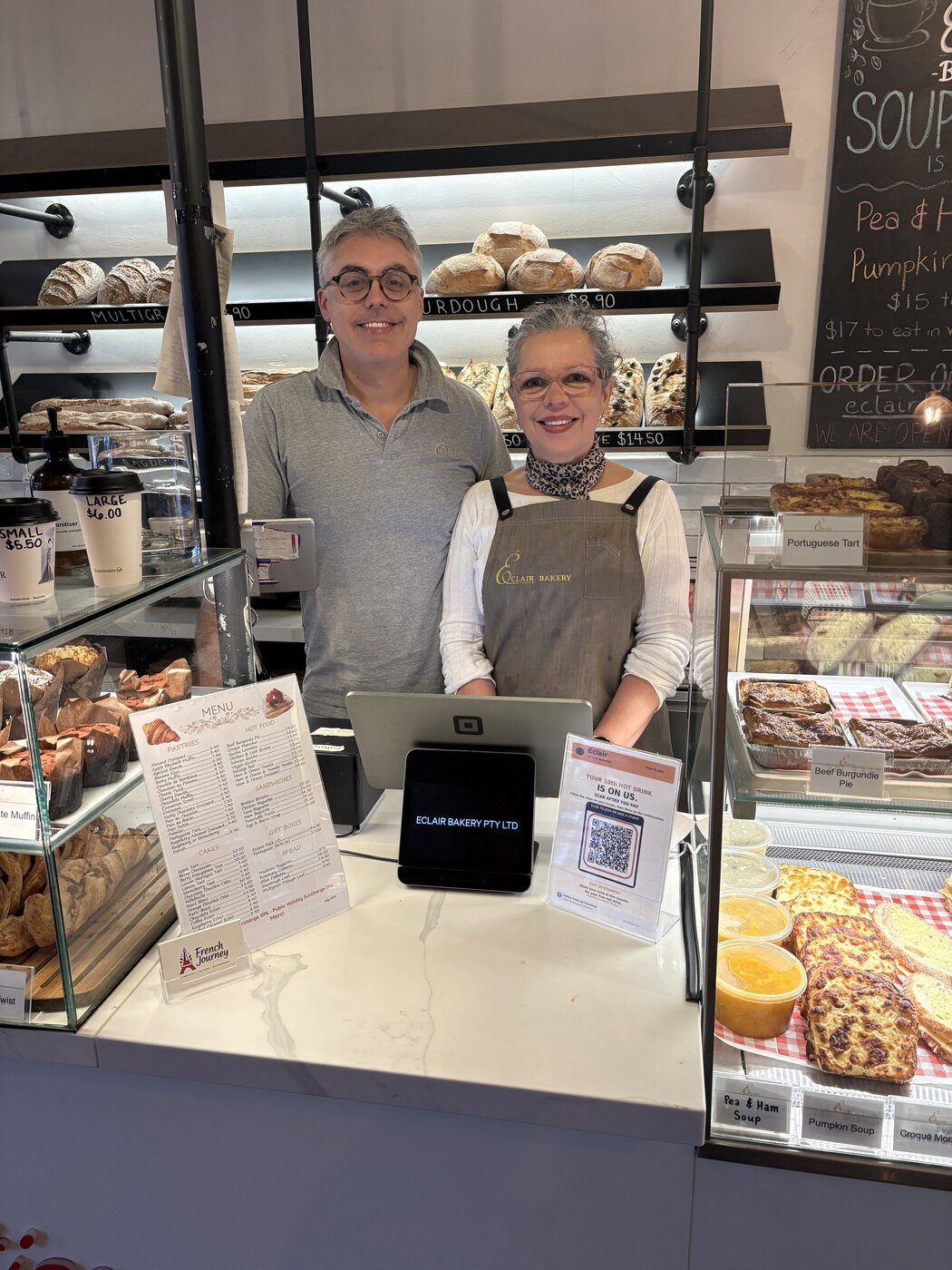 Stéphane and Patricia together behind the counter at Éclair Boulangerie, Hampton